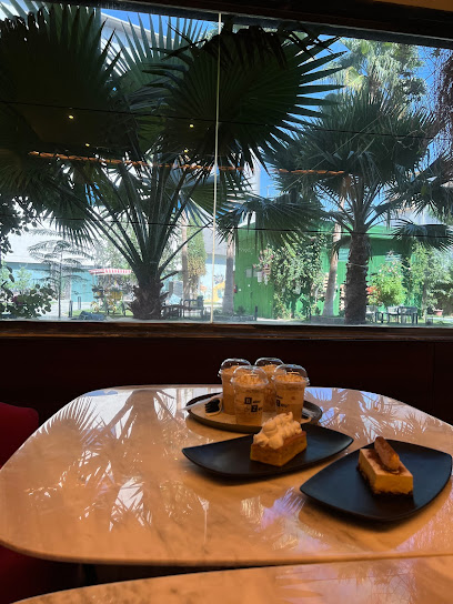 The District Coffee - Saudi Arabia|6615 شارع سعيد بن المسيب، نجران 66251 3889،